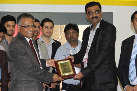 Our Executive director recieving the prize for most innovative stall
